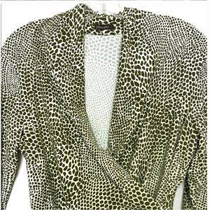 Beautiful green and white animal print blouse.